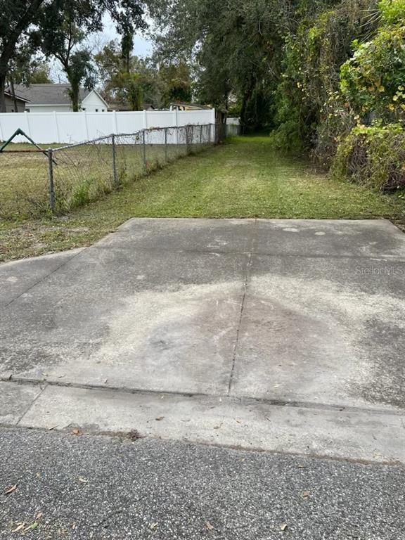 3rd Street Orlando, FL 32824 - Photo 7 of 8 a view of a backyard