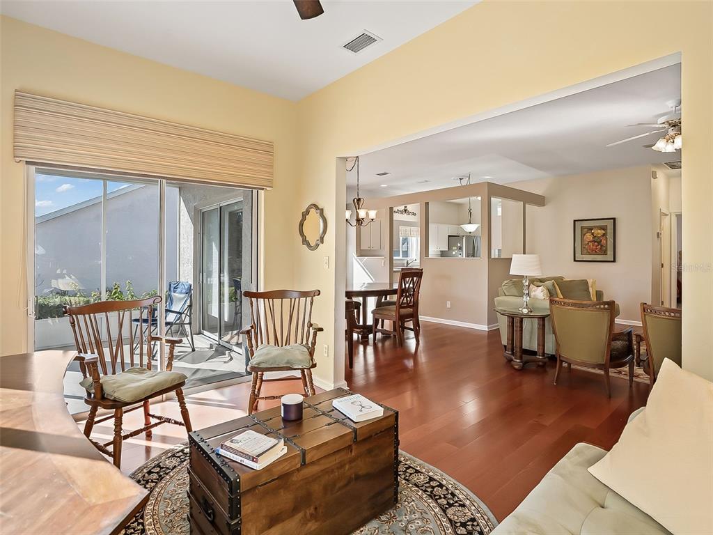 2323 Northwest 55th Avenue Road Ocala, FL 34482 - Photo 14 of 43 a living room with furniture a rug and a window