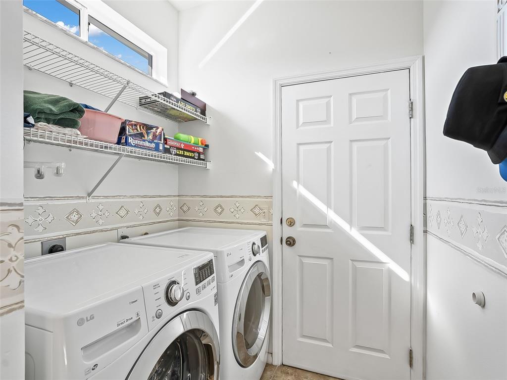2323 Northwest 55th Avenue Road Ocala, FL 34482 - Photo 28 of 43 a utility room with dryer and washer