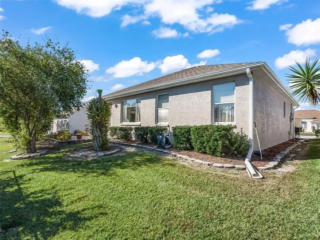 a front view of a house with a patio