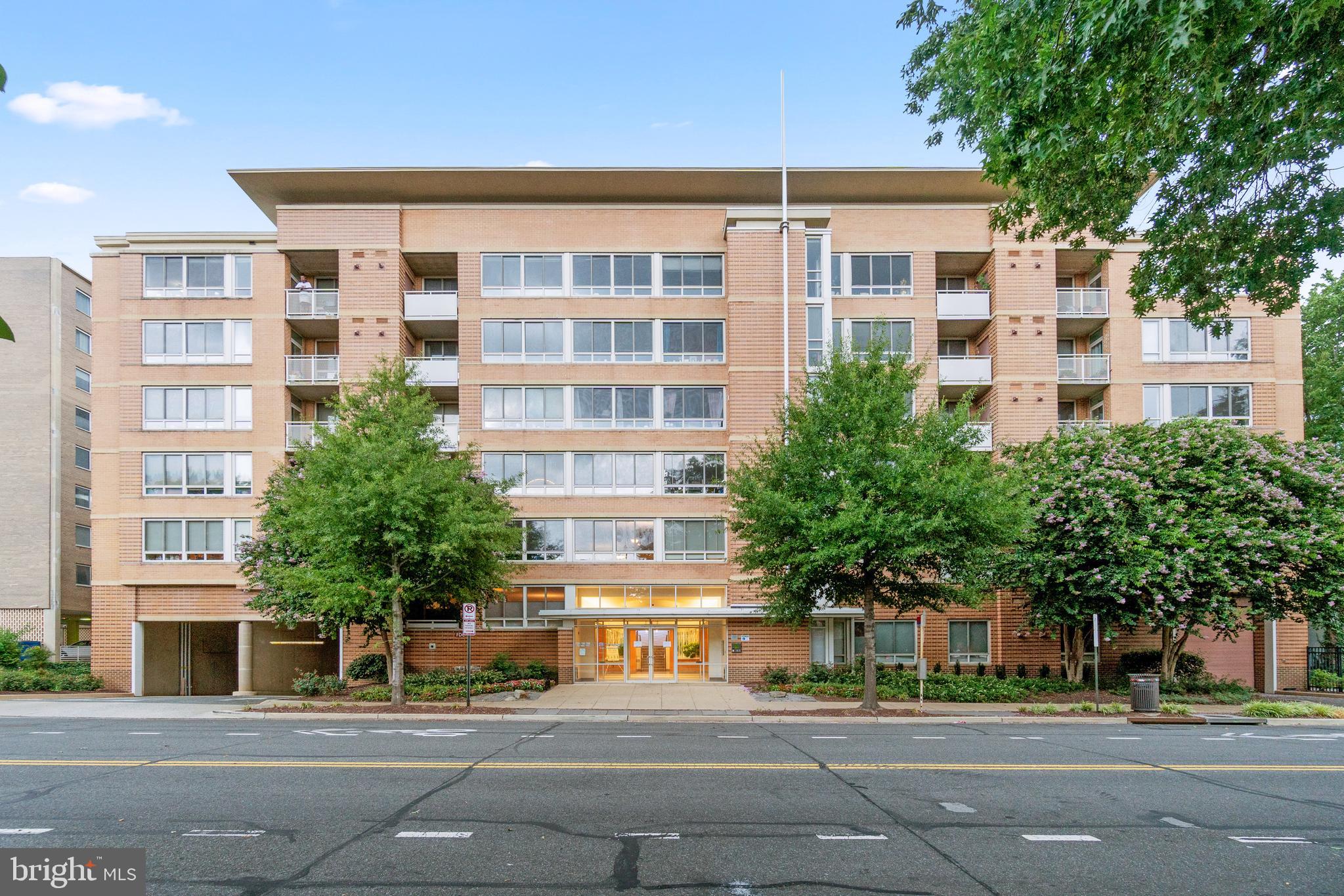 a front view of a building with street view