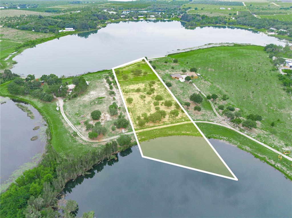 539 Eucalyptus Road Lake Wales, FL 33898 - Photo 3 of 19 a view of a tennis court