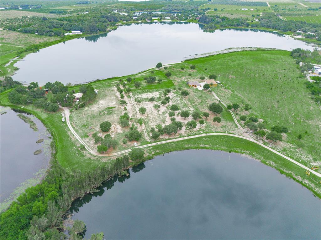 539 Eucalyptus Road Lake Wales, FL 33898 - Photo 4 of 19 a view of a lake with a park