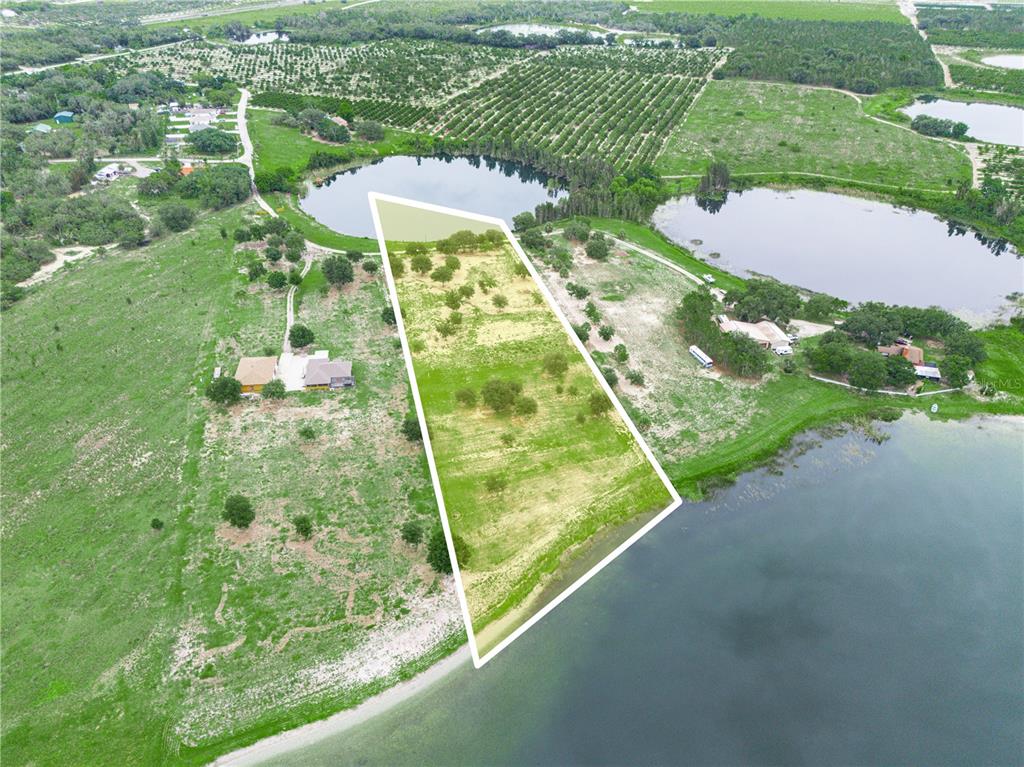 539 Eucalyptus Road Lake Wales, FL 33898 - Photo 9 of 19 an aerial view of a residential houses with outdoor space and street view