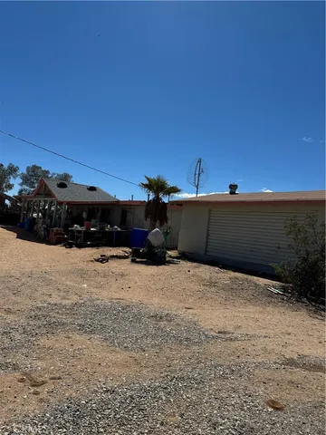a view of a backyard of a house