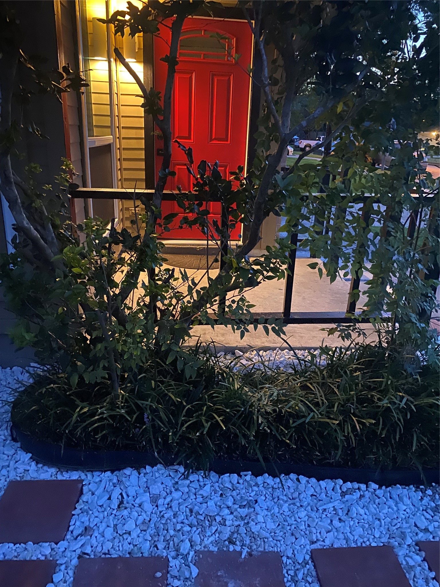 3107 Raccoon Run Spring, TX 77373 - Photo 4 of 35 Peek of front door just before dawn showing landscaping rocks and front porch