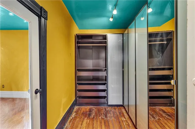 a view of front door with wooden floor