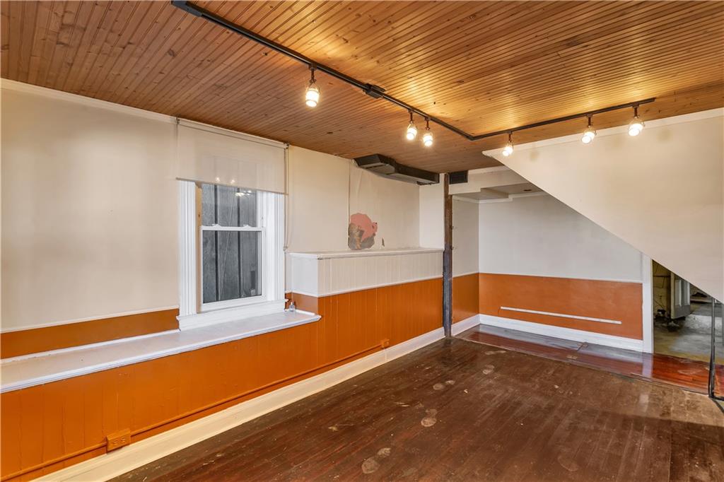 85 Wyoming Street Pittsburgh, PA 15211 - Photo 28 of 33 a view of an empty room with a window