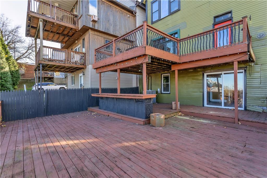 85 Wyoming Street Pittsburgh, PA 15211 - Photo 31 of 33 a view of a house with a deck