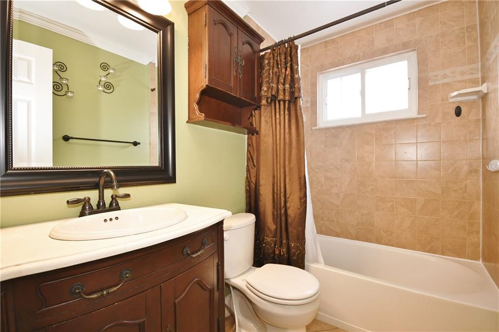 200 West Bruceton Road Pittsburgh, PA 15236 - Photo 13 of 25 Wow, an updated bath to enjoy! Neutral ceramic tile in the shower and floor, updated vanity, fixtures and lighting. All in great condition!