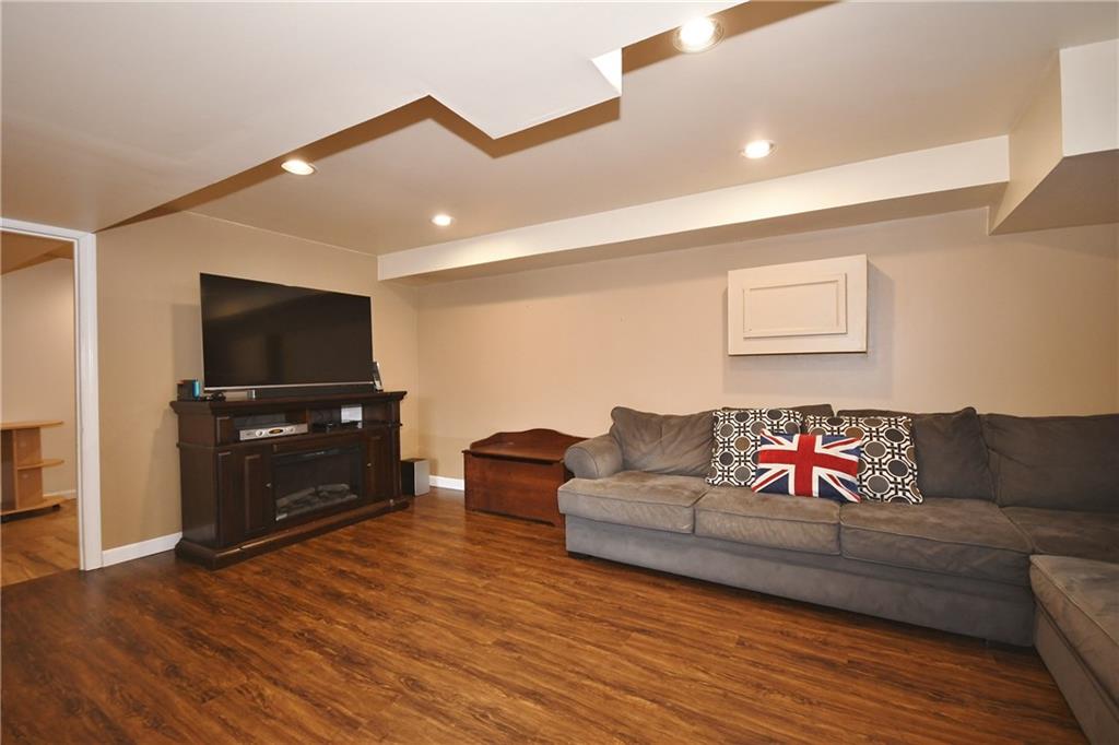 200 West Bruceton Road Pittsburgh, PA 15236 - Photo 16 of 25 Expand your living space to the lower level which is very spacious and includes amazing updated features. A very easy care laminate floor is great for children or pets. There's so much room for furniture and you and your guests will love watching football games, TV series and movies on a flat screen TV.