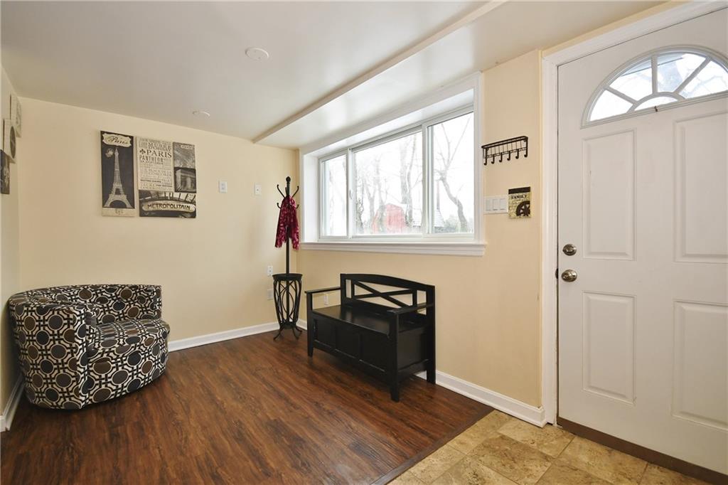200 West Bruceton Road Pittsburgh, PA 15236 - Photo 19 of 25 A large picture window provides an abundance of light to enter the game room while the door to the outside includes a palladium window for even more light. Step in to the ceramic tile entry.
