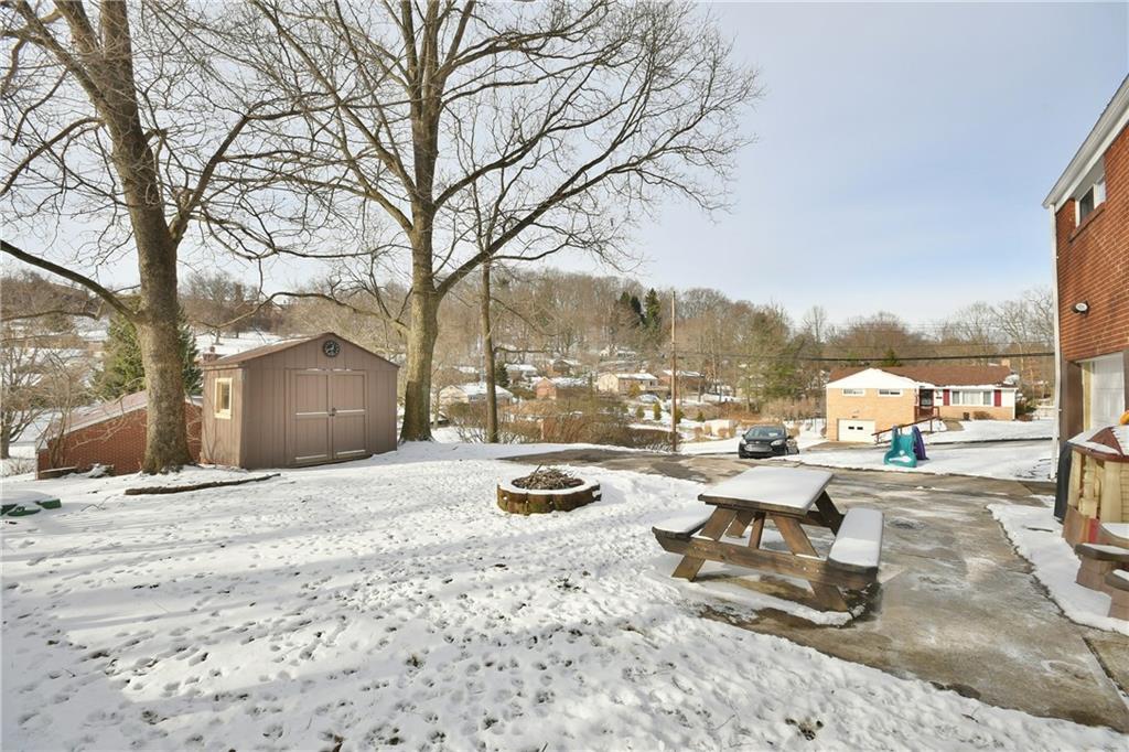 200 West Bruceton Road Pittsburgh, PA 15236 - Photo 22 of 25 Enjoy a fire pit, patio and the extra storage in the back yard during summer months. There's room for a play set, too!
