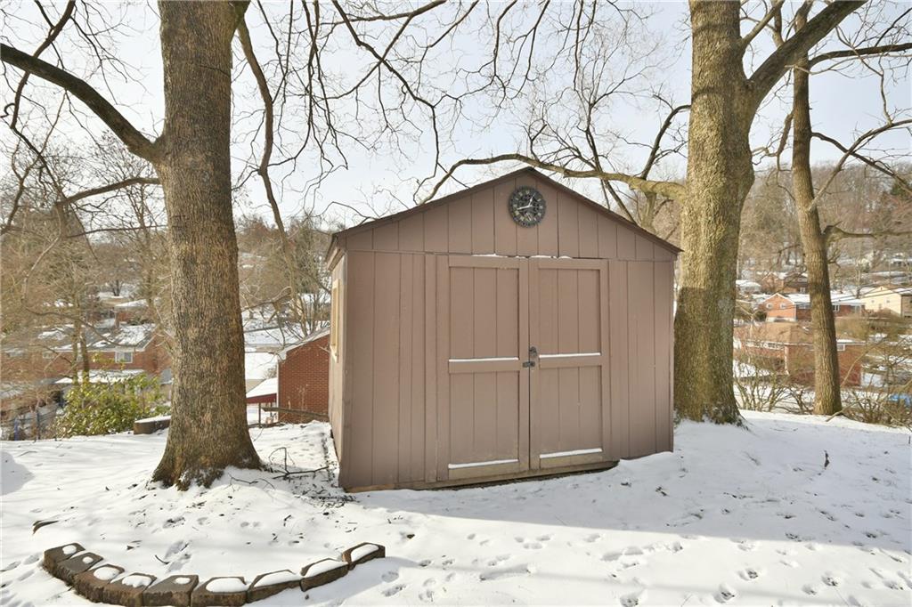 200 West Bruceton Road Pittsburgh, PA 15236 - Photo 24 of 25 The back yard is shaded in the summertime by the large trees surrounding the shed.