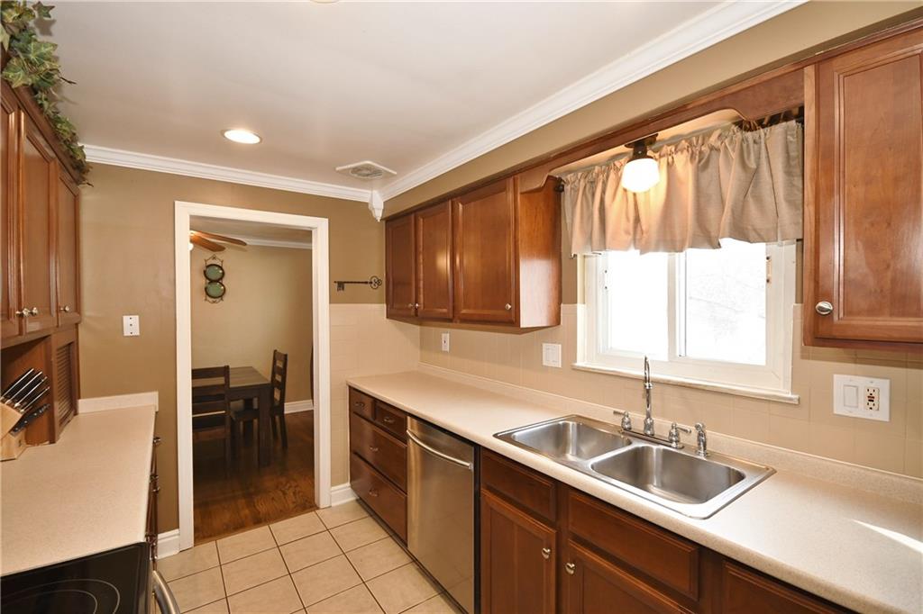 200 West Bruceton Road Pittsburgh, PA 15236 - Photo 8 of 25 What a delightful kitchen with plenty of counter space to display all the great food you will have at your next party. Ceramic tile floor and stainless steel appliances are added features of this kitchen.