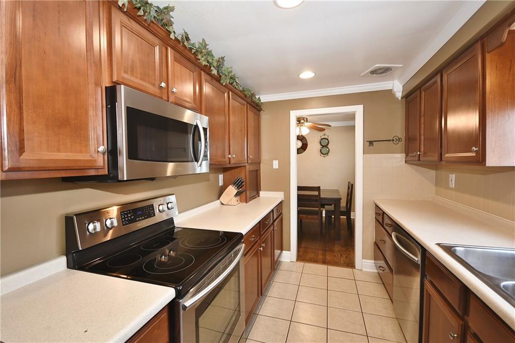 200 West Bruceton Road Pittsburgh, PA 15236 - Photo 9 of 25 Another view of the fully equipped kitchen as it opens to the dining room.