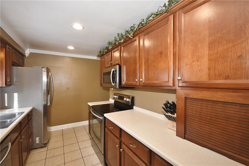 200 West Bruceton Road Pittsburgh, PA 15236 - Photo 10 of 25 This kitchen includes an appliance garage to keep things looking neat and clean.