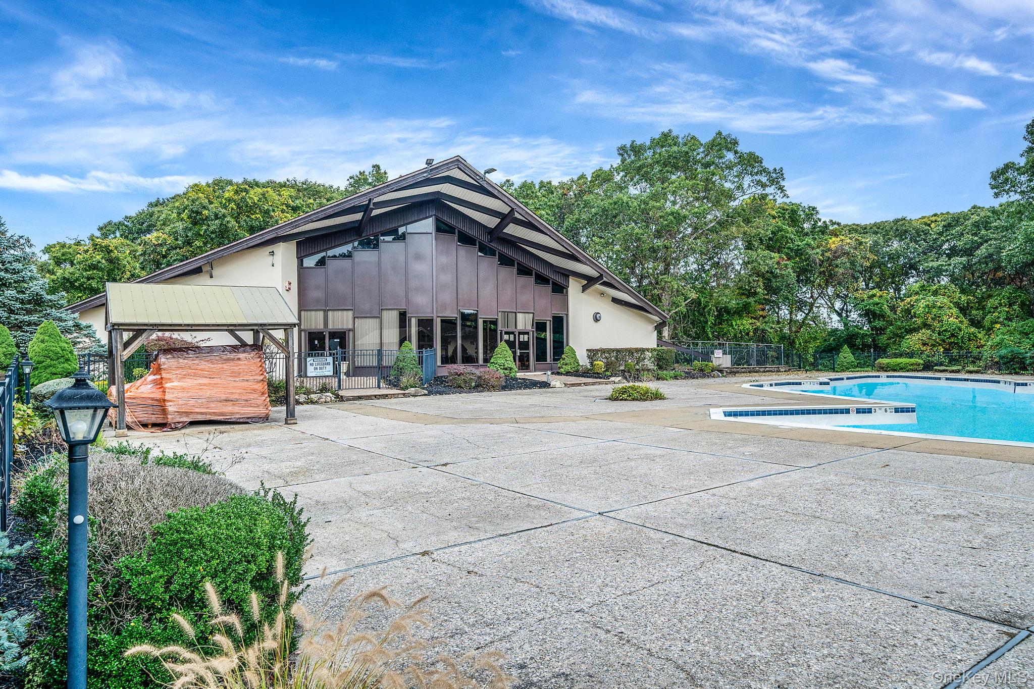 8 Juniper Court, Unit 8 Selden, NY 11784 - Photo 12 of 14 Clubhouse/Pool