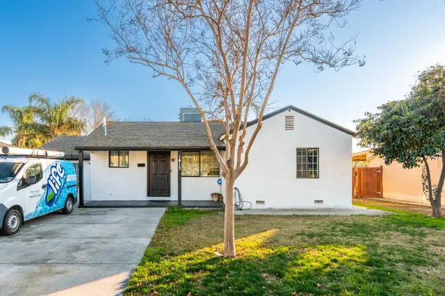 a view of a house with garden