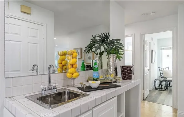 a kitchen with a sink and a window