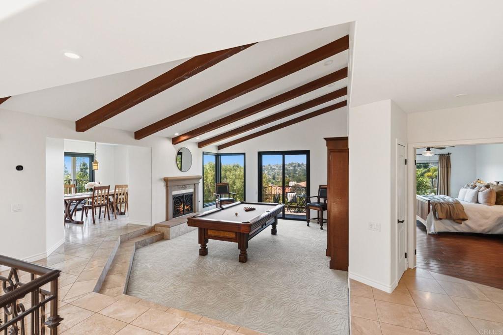 13319 Pacer Lane Poway, CA 92064 - Photo 22 of 75 a living room with furniture and a large window
