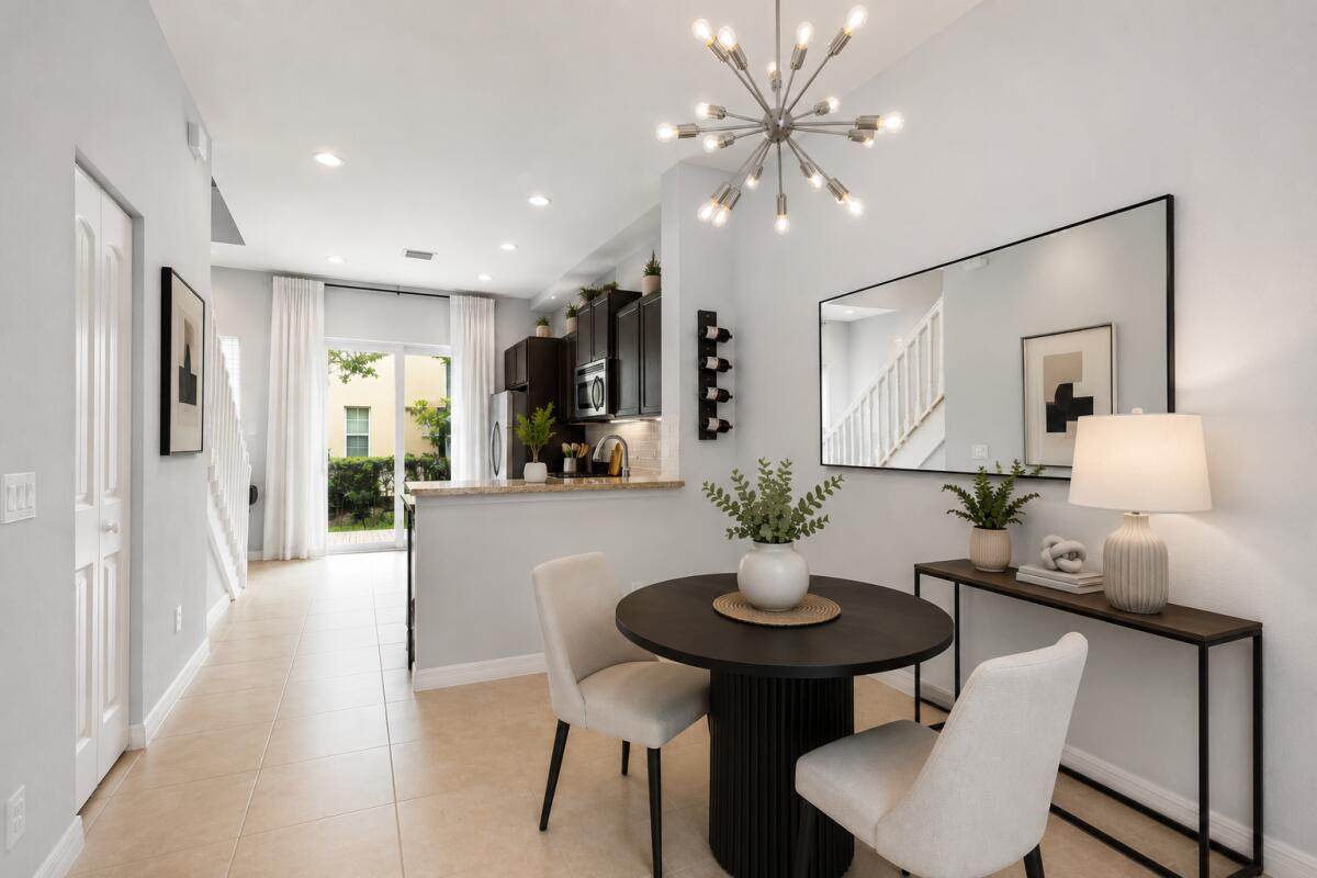 468 Francesca Ridge Road Boynton Beach, FL 33435 - Photo 3 of 11 a view of a dining room with furniture and wooden floor