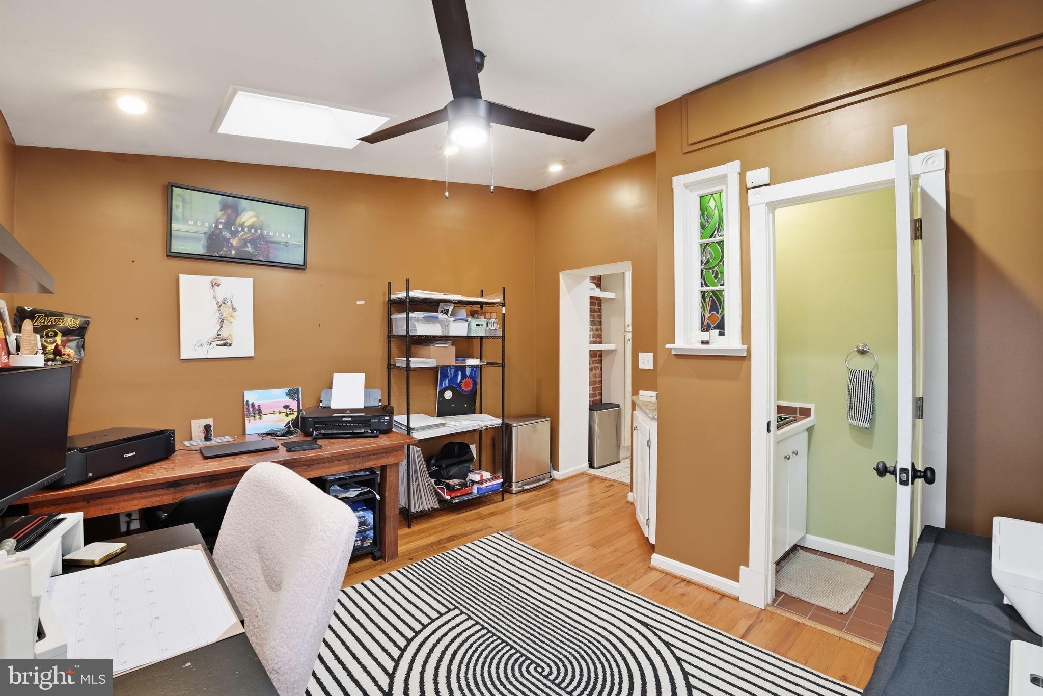 1616 D Street Southeast Washington, DC 20003 - Photo 14 of 37 a workspace with furniture