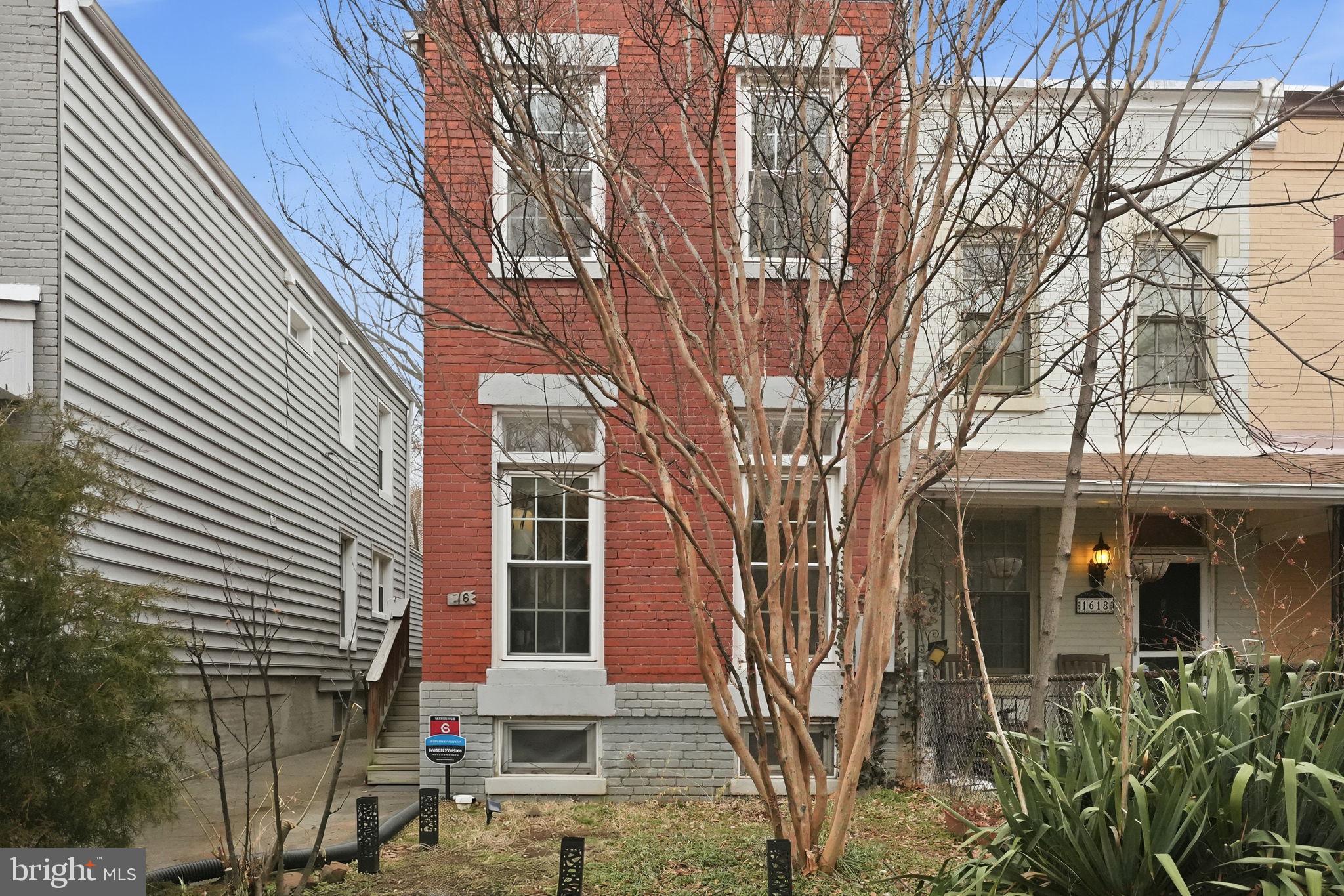 1616 D Street Southeast Washington, DC 20003 - Photo 32 of 37 front view of a house with a trees