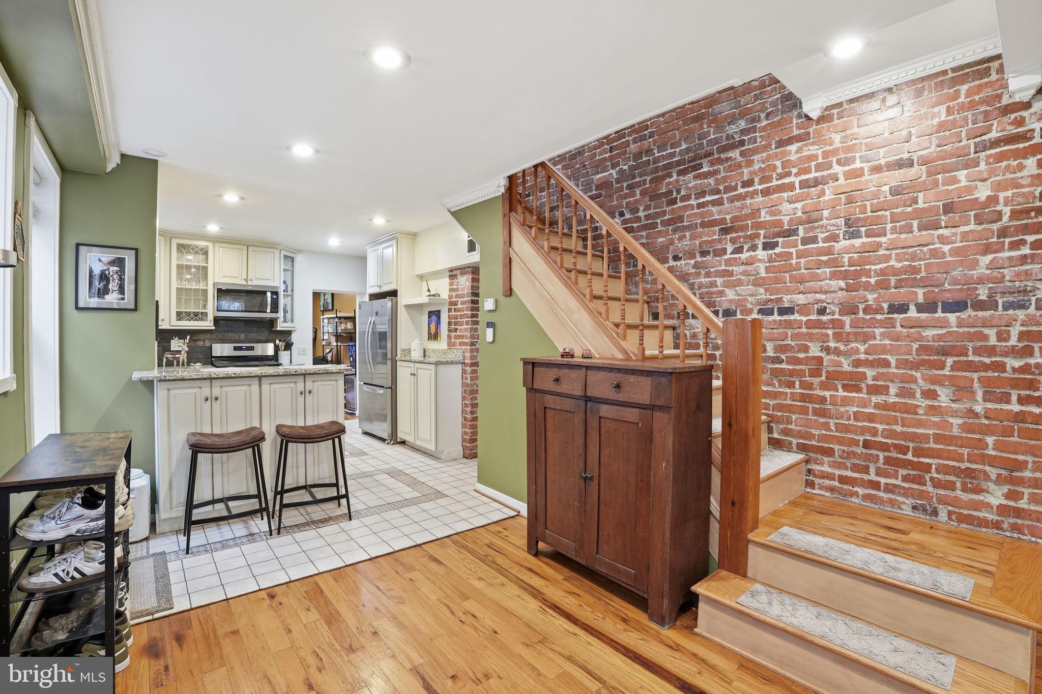 1616 D Street Southeast Washington, DC 20003 - Photo 7 of 37 a view of kitchen with furniture and wooden floor
