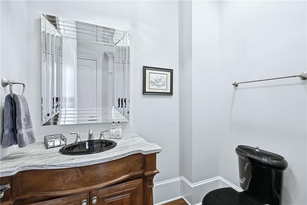 2957 Darlington Run Duluth, GA 30097 - Photo 11 of 58 a bathroom with a sink and a mirror
