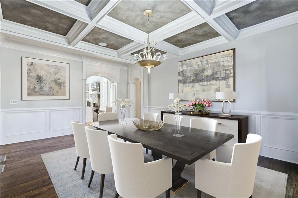 2957 Darlington Run Duluth, GA 30097 - Photo 13 of 58 a view of a dining room with furniture a chandelier and wooden floor