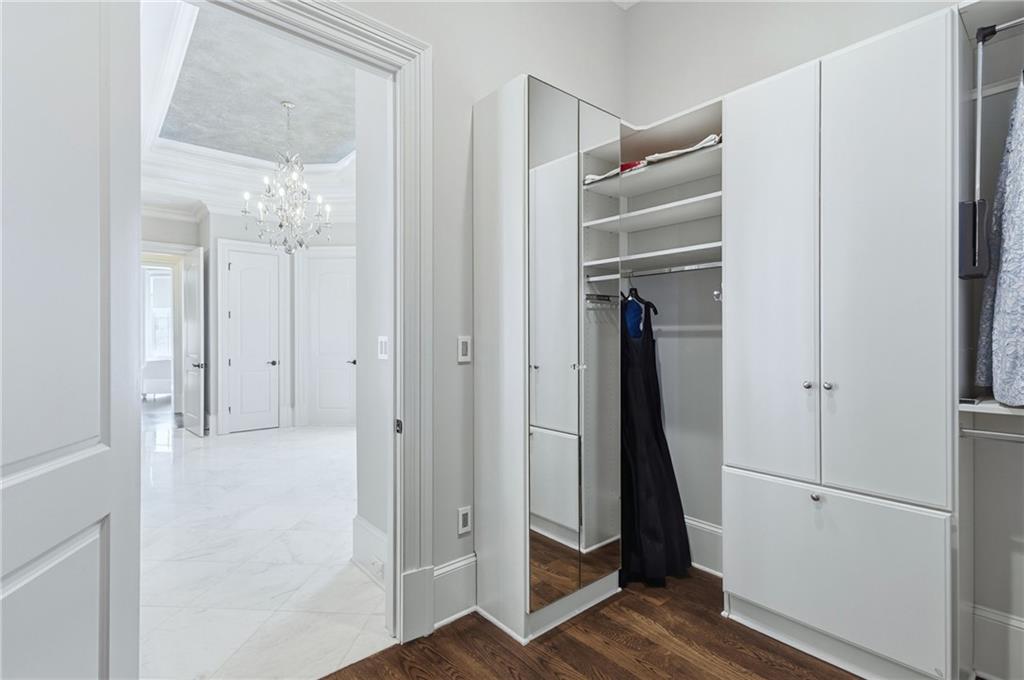 2957 Darlington Run Duluth, GA 30097 - Photo 33 of 58 a view of closet with wooden floor