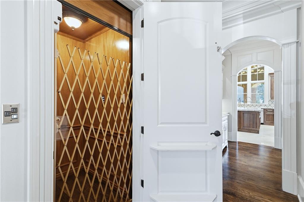 2957 Darlington Run Duluth, GA 30097 - Photo 34 of 58 a view of a hallway with wooden floor