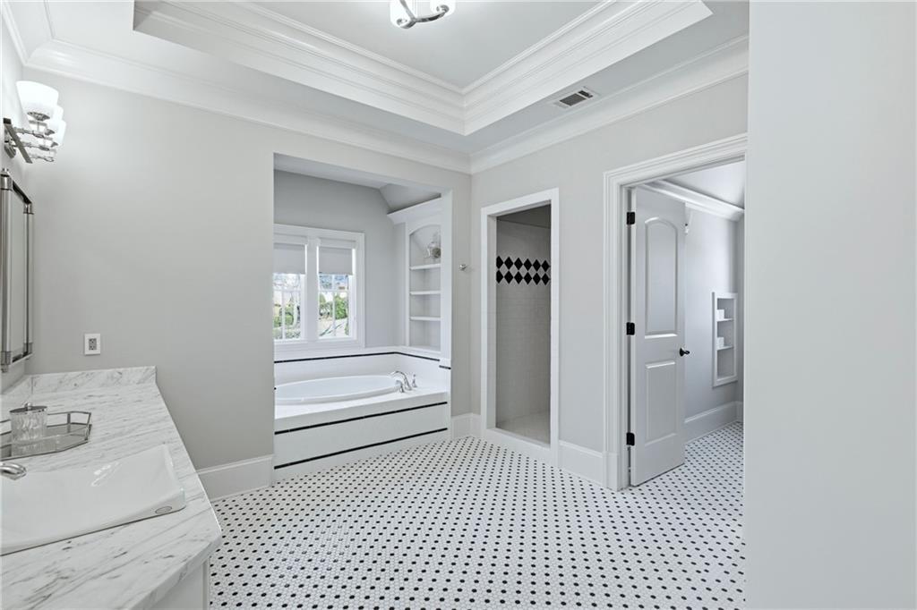 2957 Darlington Run Duluth, GA 30097 - Photo 48 of 58 a bathroom with a sink a toilet and shower