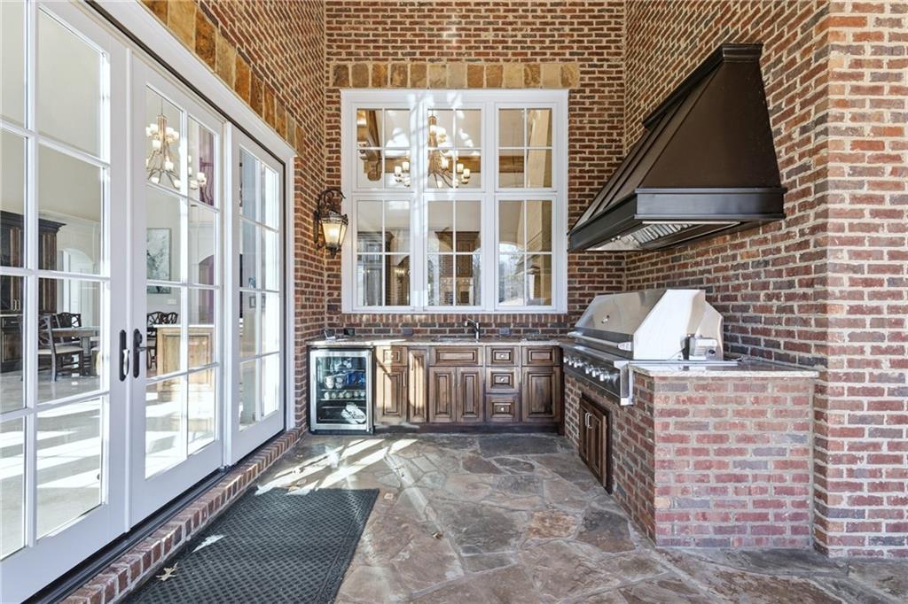 2957 Darlington Run Duluth, GA 30097 - Photo 51 of 58 a view of a brick building with a outdoor space