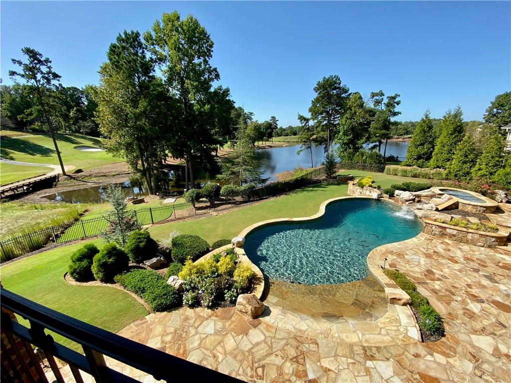 2957 Darlington Run Duluth, GA 30097 - Photo 57 of 58 a view of a swimming pool and lounge chair