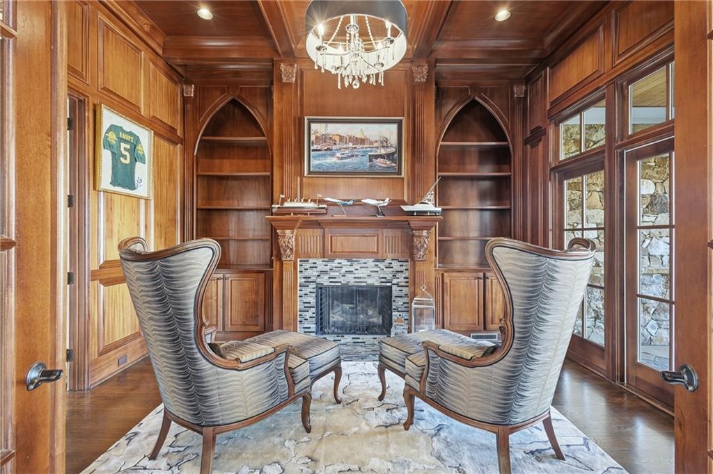 2957 Darlington Run Duluth, GA 30097 - Photo 8 of 58 a view of a hallway with chairs and chandelier