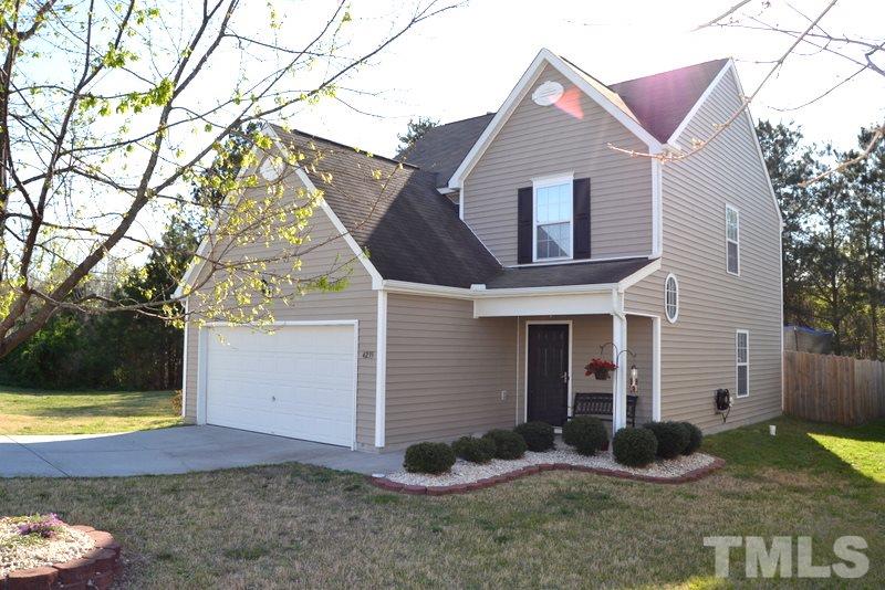4235 Dalcross Road Raleigh, NC 27610 - Photo 3 of 25 a view of a house with backyard and garden