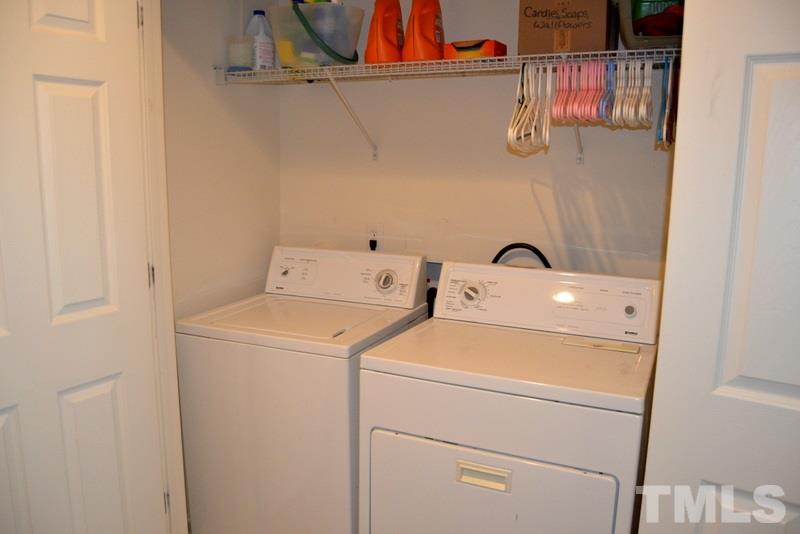 4235 Dalcross Road Raleigh, NC 27610 - Photo 21 of 25 a utility room with dryer and washer