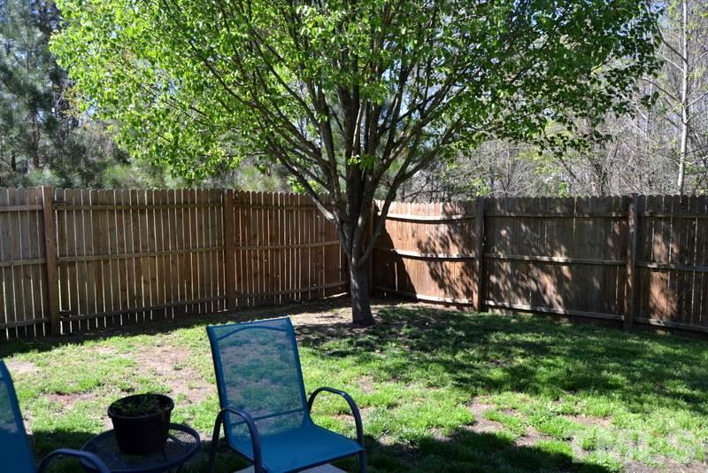 4235 Dalcross Road Raleigh, NC 27610 - Photo 24 of 25 a garden view with a seating space