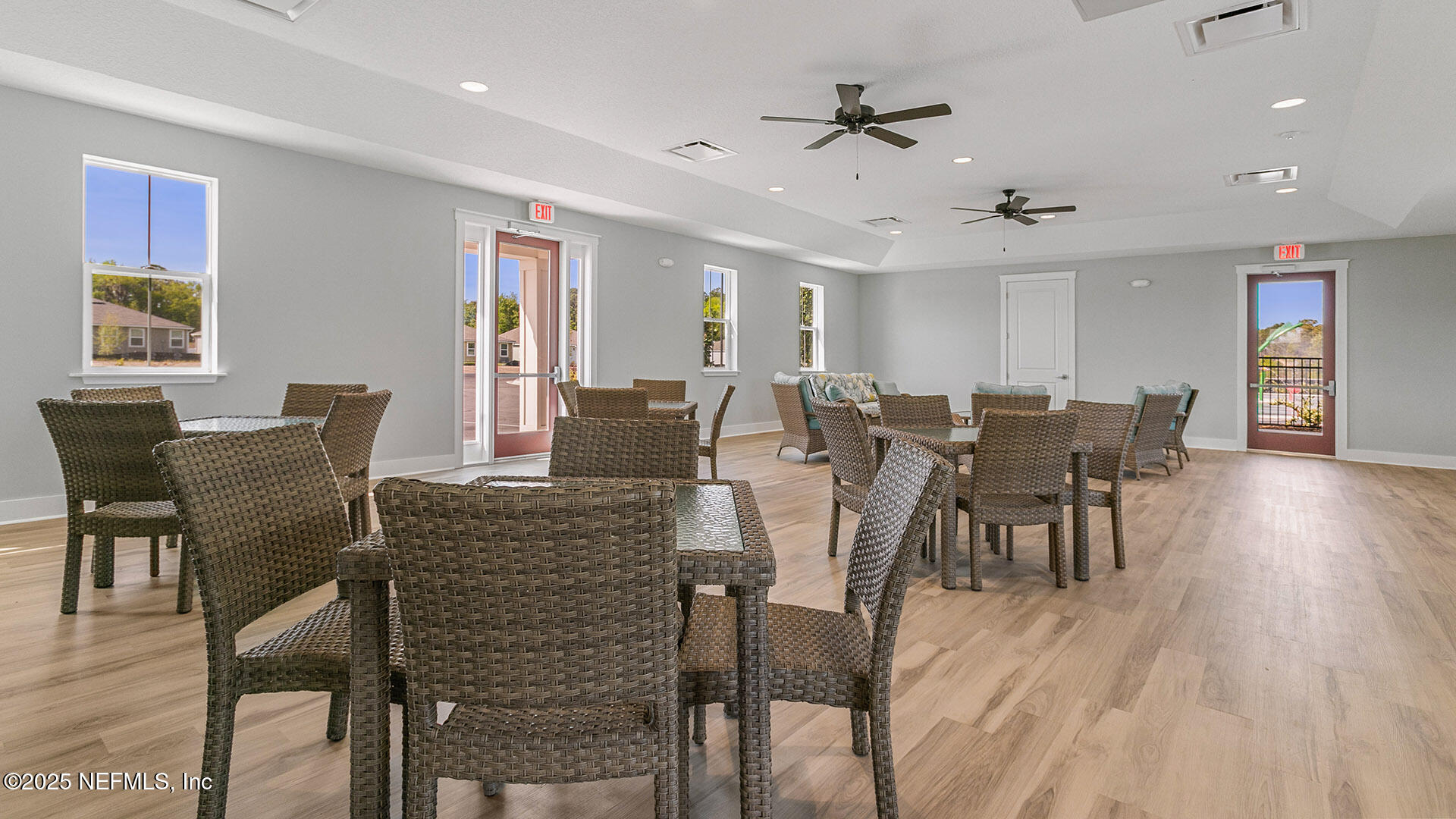 12343 Great Eagle Road Jacksonville, FL 32219 - Photo 25 of 44 a view of a dining room with furniture and wooden floor