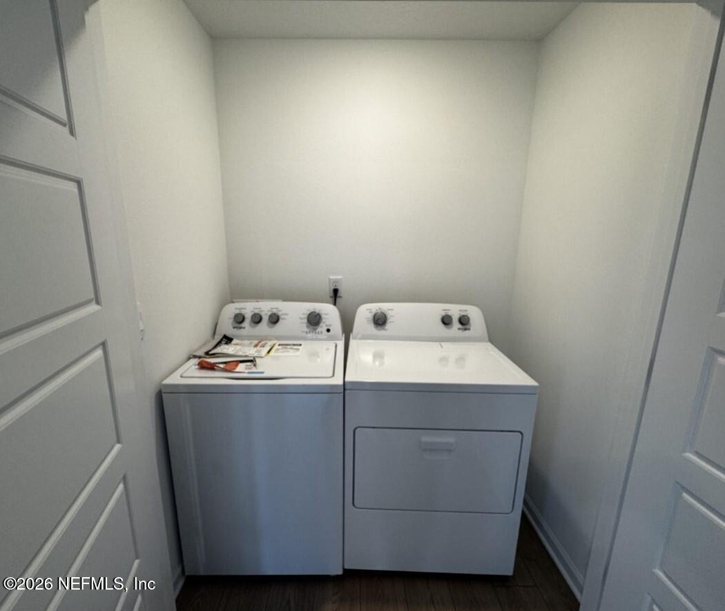 12343 Great Eagle Road Jacksonville, FL 32219 - Photo 8 of 44 a utility room with dryer and washer