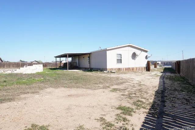 a house view with a outdoor space