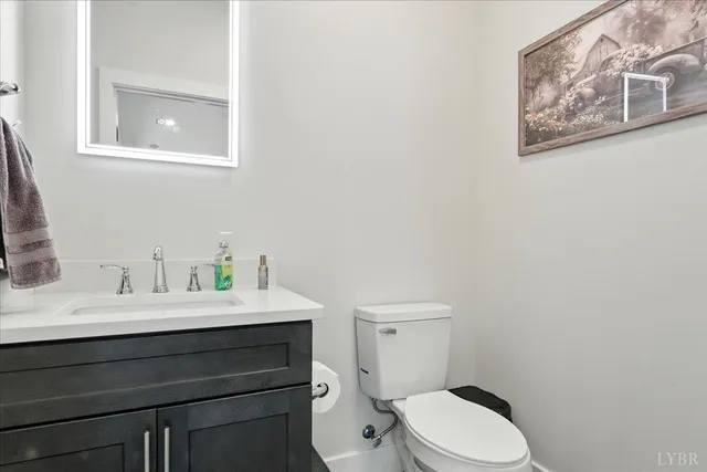 a bedroom with a bed and cabinet