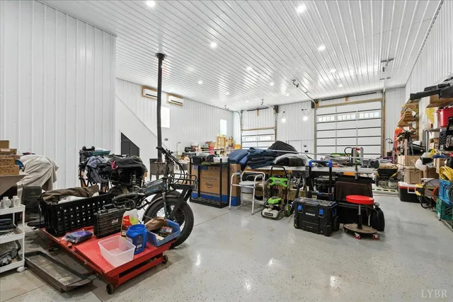 a front view of house with yard and swimming pool