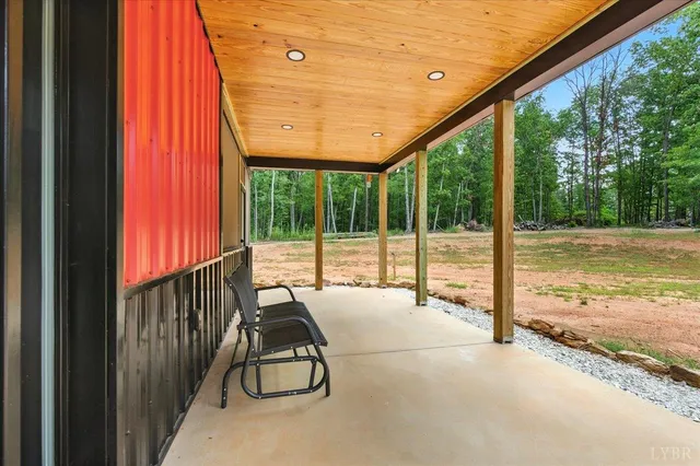 a living room with fireplace furniture and a flat screen tv