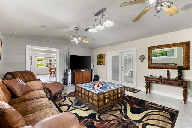 a view of a chair and table under an umbrella