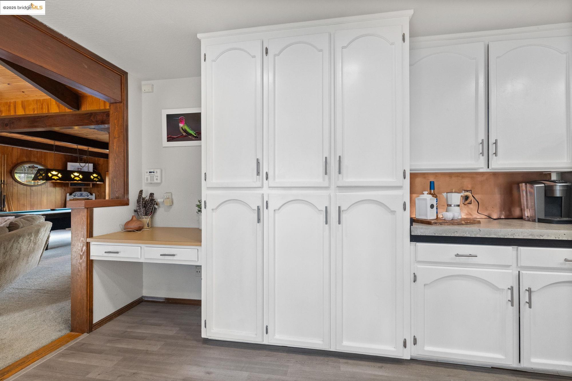21950 Paseo De Los Portales Road Sonora, CA 95370 - Photo 13 of 47 a view of cabinets with wooden floor