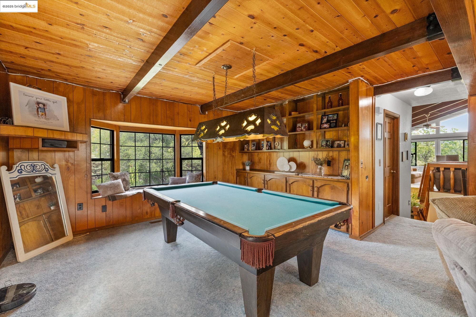 21950 Paseo De Los Portales Road Sonora, CA 95370 - Photo 22 of 47 a room with pool table and windows