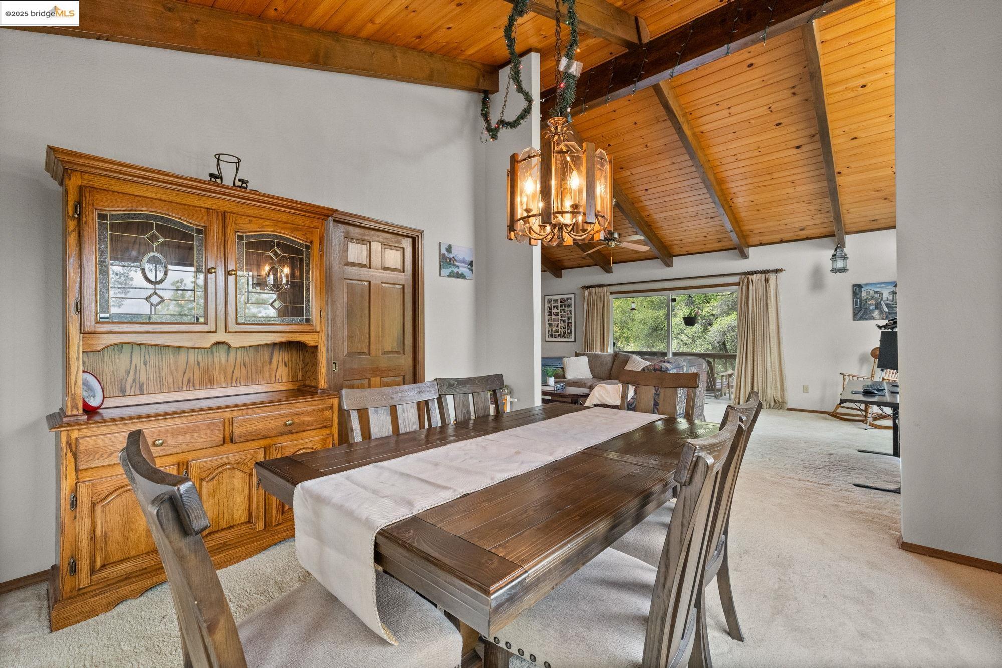 21950 Paseo De Los Portales Road Sonora, CA 95370 - Photo 8 of 47 a view of a dining room with furniture window and outside view